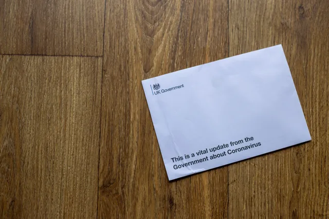 A UK Government envelope with coronavirus update on a wooden floor. How to build a creator tax 2027 trends watchlist from official sources