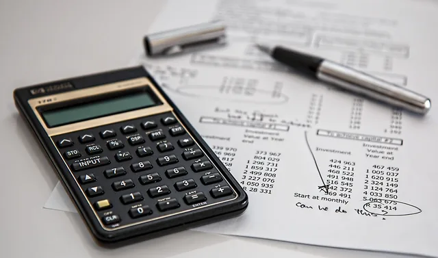 calculator, calculation, insurance, finance, accounting, pen, fountain pen, investment, office, work, taxes, calculator, insurance, insurance, finance, finance, finance, finance, finance, accounting, accounting, accounting, investment, taxes. What creator tax return on investment means for England creators