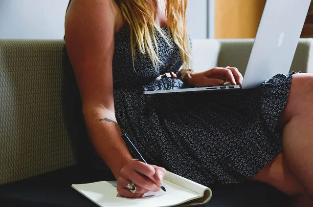 entrepreneur, startup, woman, macbook, laptop, planning, business, businesswoman, young, working, freelance, freelancer, notepad, notebook, sitting, couch, write, writing, work from home, entrepreneur, laptop, planning, writing, writing, writing, writing, writing. Creator tax selection checklist explained for England freelancers