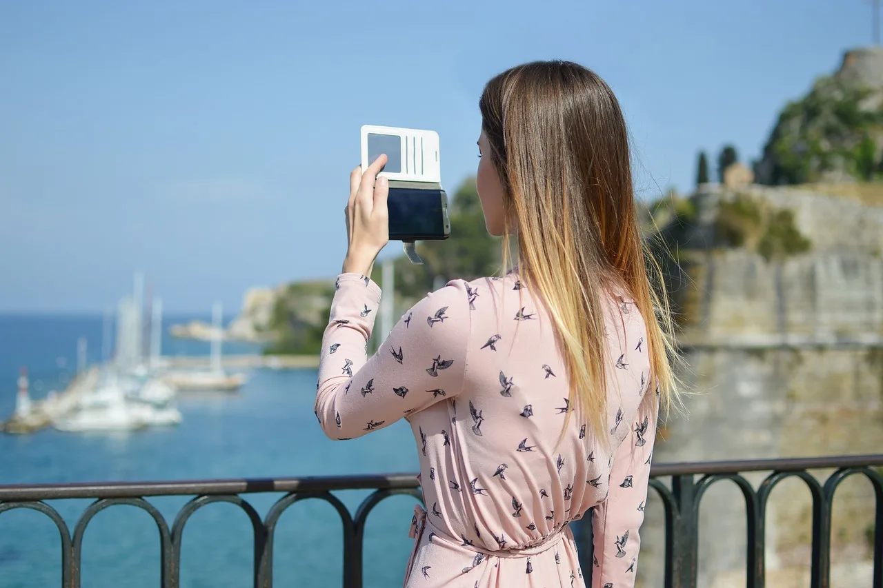 people, girl, woman, lady, female, clothing, fashion, model, mobile, phone, smartphone, camera, blue phone, blue fashion, blue camera, blue mobile, blue model, blue clothes, blue smartphone, blue telephone, blue lady