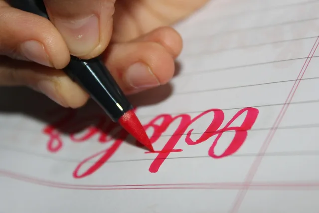 paper, pen, writing, notebook, pink pen, handwriting, lettering. Side hustle tax: the £1,000 allowance for creators